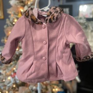 Pink fur trimmed coat